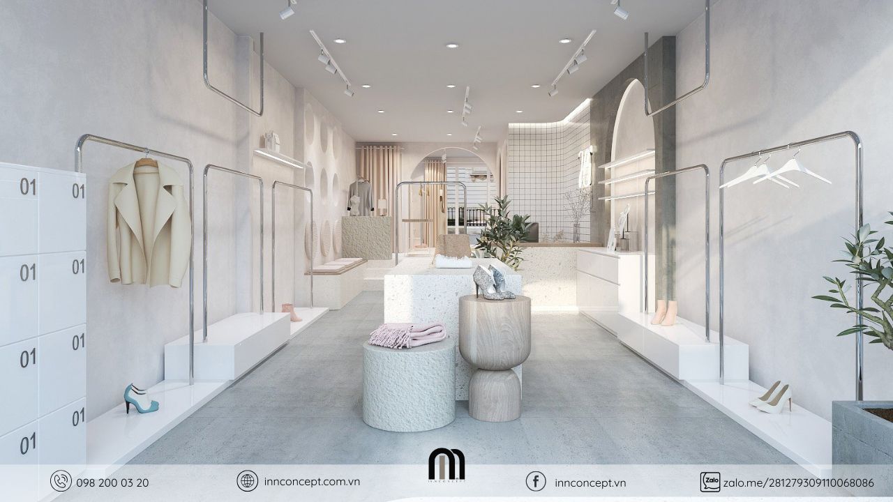 Hệ giá treo inox cao cấp trong thiết kế nội thất shop thời trang.